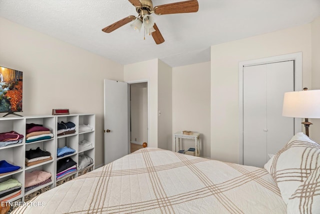 bedroom featuring a closet and ceiling fan