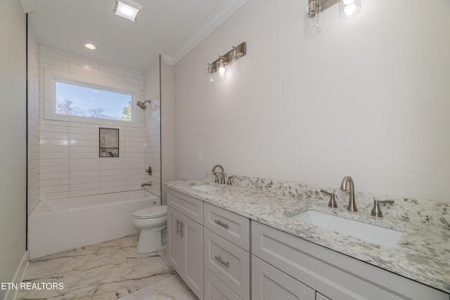 full bath with double vanity, marble finish floor, toilet, and a sink