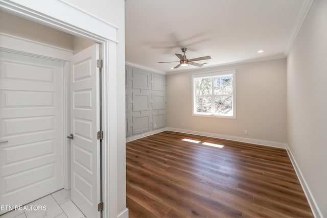 unfurnished bedroom with recessed lighting, baseboards, wood finished floors, and crown molding