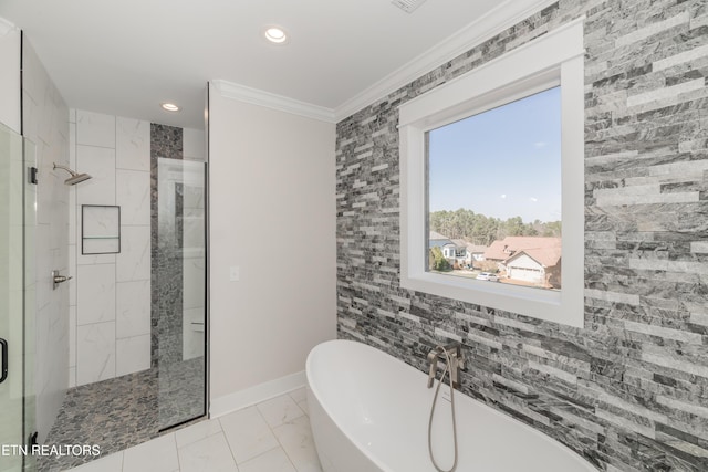 bathroom featuring recessed lighting, tiled shower, crown molding, baseboards, and a soaking tub