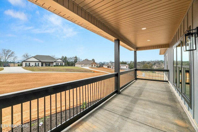 balcony featuring a residential view