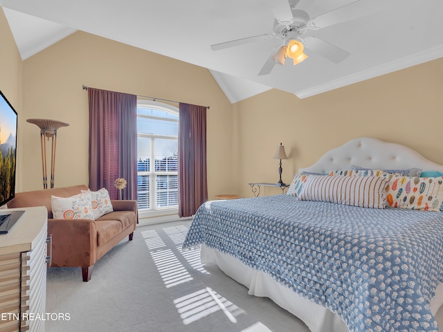 bedroom with light colored carpet, a ceiling fan, crown molding, and lofted ceiling