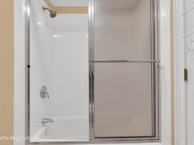 full bathroom featuring shower / bath combination with glass door