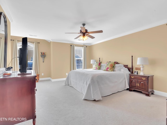 bedroom featuring visible vents, ceiling fan, baseboards, ornamental molding, and light carpet