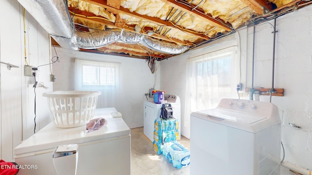 laundry area with washing machine and dryer