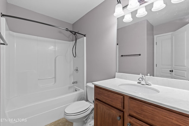 full bath featuring vanity, toilet, and tub / shower combination