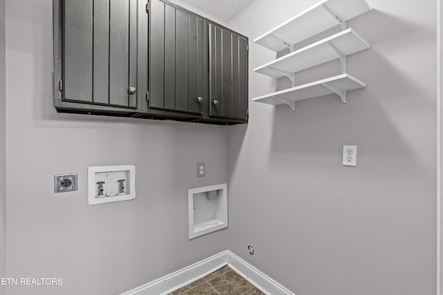 washroom with baseboards, hookup for a washing machine, hookup for a gas dryer, cabinet space, and electric dryer hookup
