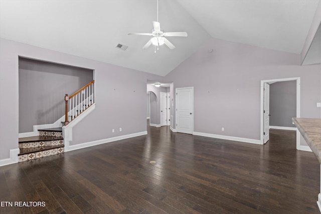 unfurnished living room featuring visible vents, stairway, ceiling fan, and wood finished floors