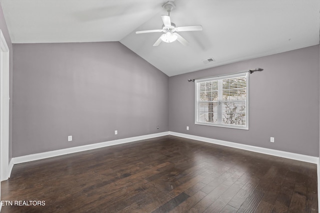 unfurnished room with visible vents, a ceiling fan, wood finished floors, baseboards, and lofted ceiling