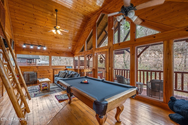 rec room with hardwood / wood-style floors, wooden ceiling, a ceiling fan, and a wealth of natural light