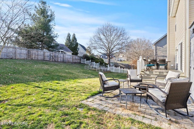 view of yard featuring a patio and a fenced backyard