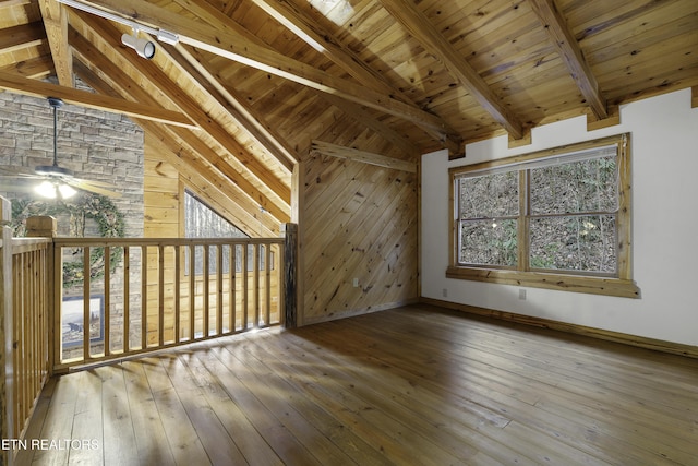 bonus room with vaulted ceiling with beams, baseboards, ceiling fan, wooden ceiling, and hardwood / wood-style flooring