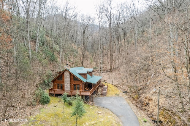 bird's eye view featuring a forest view