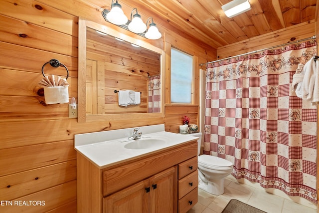 bathroom with toilet, wooden walls, tile patterned flooring, wood ceiling, and vanity