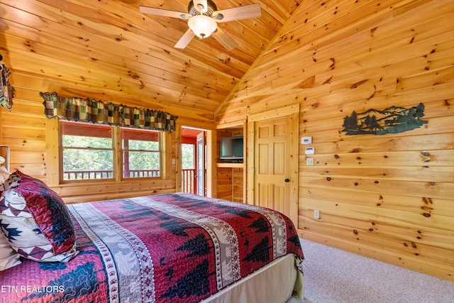 bedroom featuring lofted ceiling, carpet, wood walls, and wooden ceiling