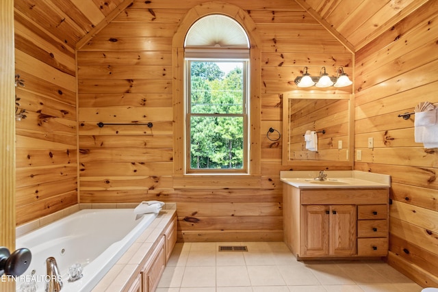 full bath featuring visible vents, a tub with jets, wooden walls, and vaulted ceiling