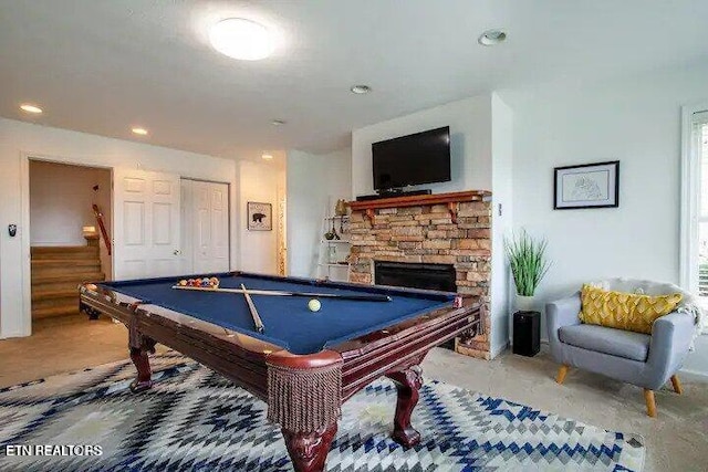 game room with a stone fireplace, recessed lighting, and billiards