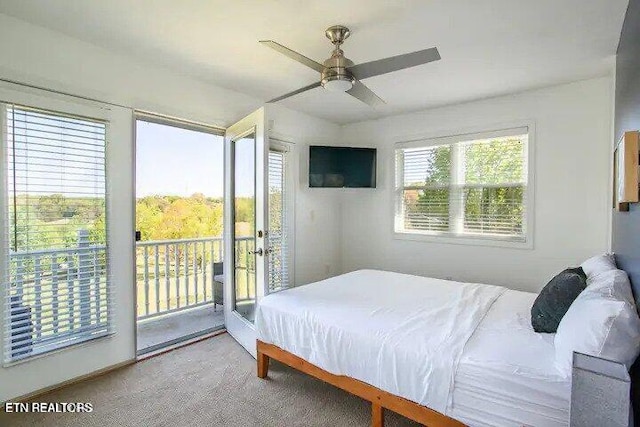 bedroom with a ceiling fan and access to outside