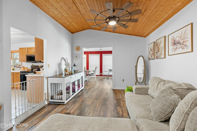 living area with vaulted ceiling, a healthy amount of sunlight, wood ceiling, and wood finished floors