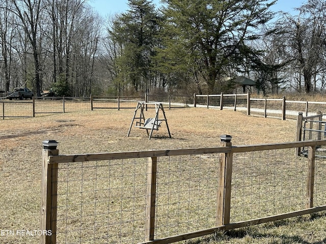 view of yard with fence