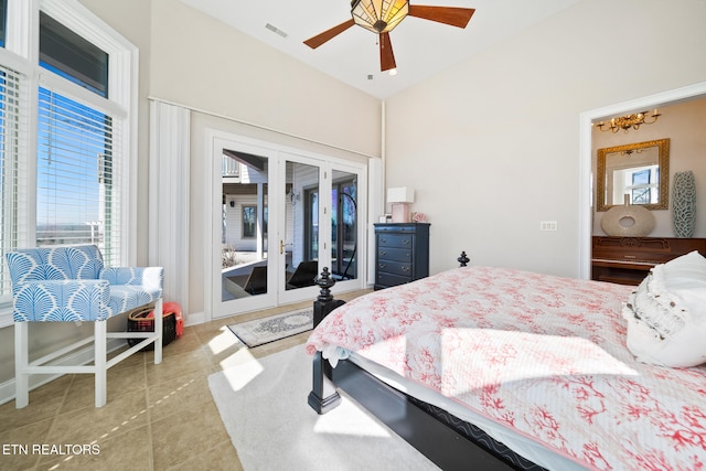 tiled bedroom with a ceiling fan, visible vents, lofted ceiling, french doors, and access to outside