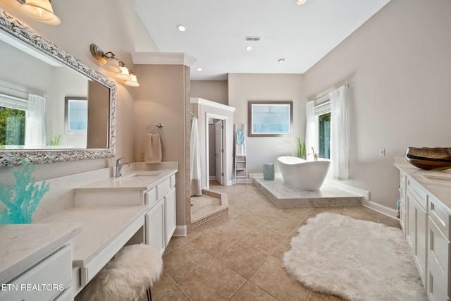 full bathroom with baseboards, visible vents, a soaking tub, recessed lighting, and tile patterned flooring