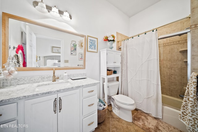 bathroom featuring tile patterned floors, shower / bath combination with curtain, toilet, and vanity