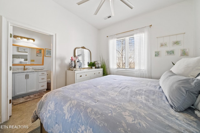 bedroom featuring ceiling fan, visible vents, light tile patterned flooring, and vaulted ceiling