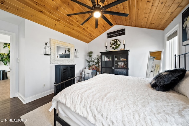 bedroom with wooden ceiling, wood finished floors, baseboards, and vaulted ceiling