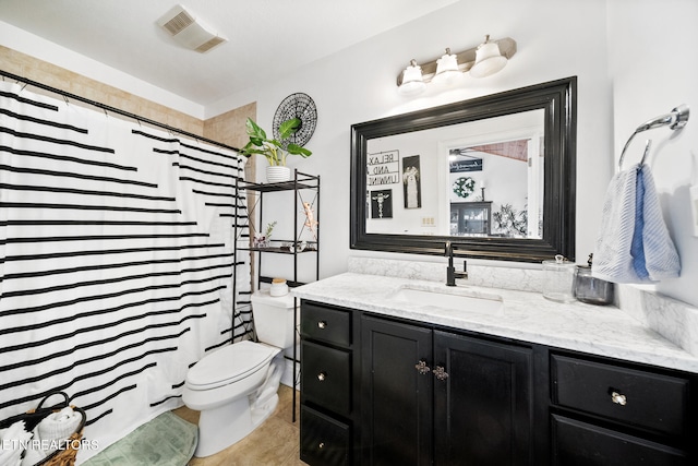 full bathroom featuring visible vents, curtained shower, toilet, and vanity