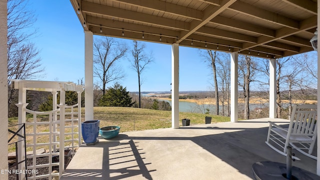 view of patio / terrace featuring a water view