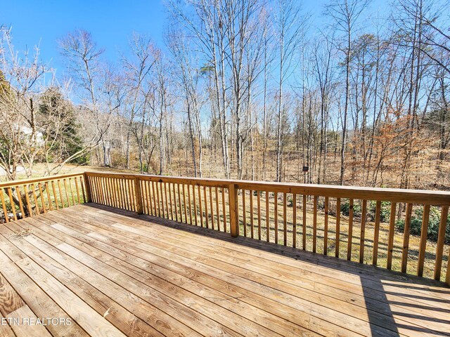 deck with a forest view