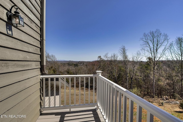 balcony with a wooded view