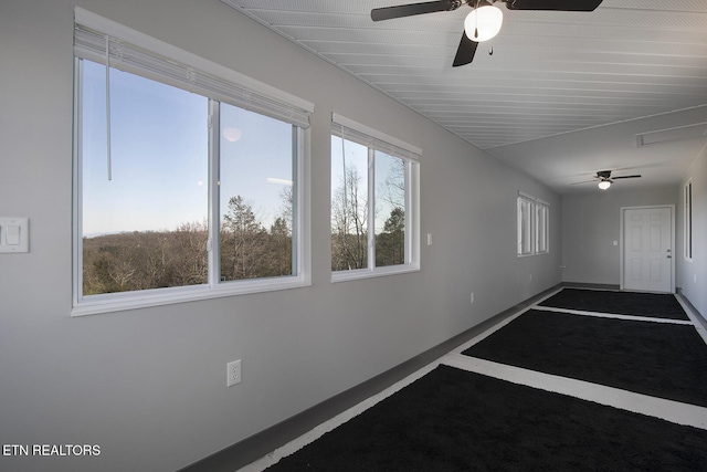 spare room with ceiling fan