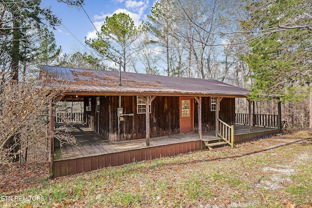 view of front of house featuring metal roof