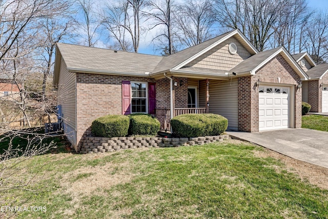 view of front facade featuring driveway, covered porch, a front yard, a garage, and brick siding