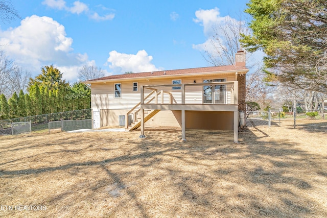 rear view of property featuring central air condition unit, stairs, fence, a wooden deck, and a chimney