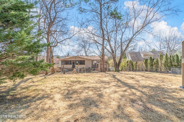 view of yard with fence