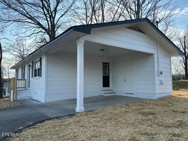 view of front of home with brick siding