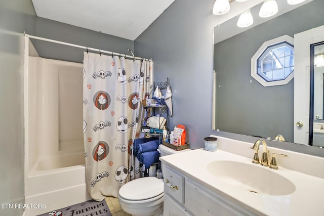 bathroom featuring tile patterned floors, vanity, toilet, and shower / tub combo