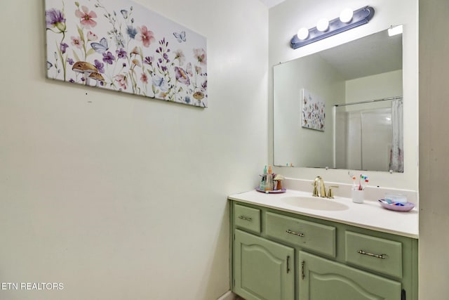 bathroom with vanity and walk in shower
