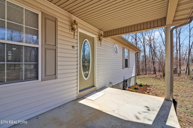 property entrance with a patio