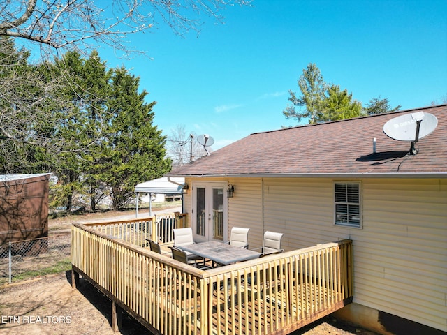 wooden deck featuring french doors