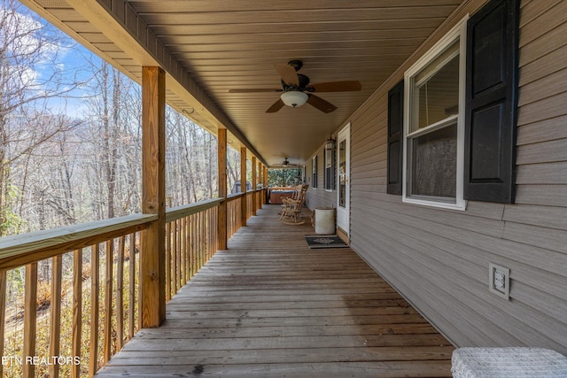 wooden terrace with ceiling fan