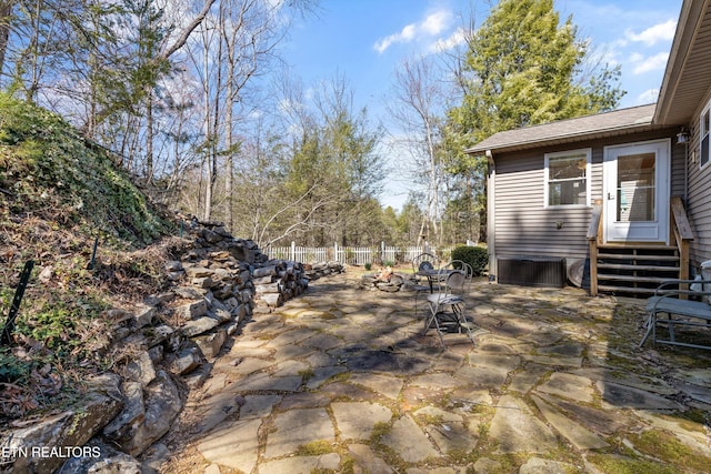 view of patio / terrace with fence and entry steps