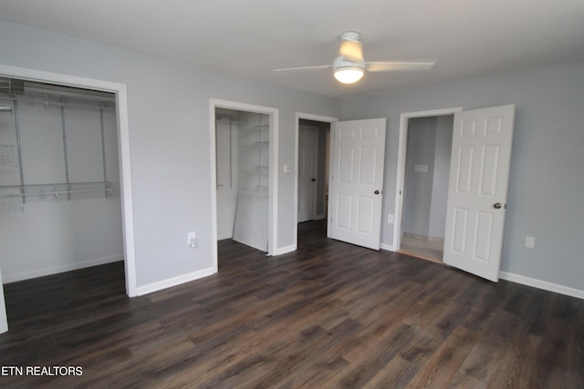 unfurnished bedroom with dark wood finished floors, ceiling fan, and baseboards