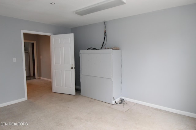 interior space featuring baseboards