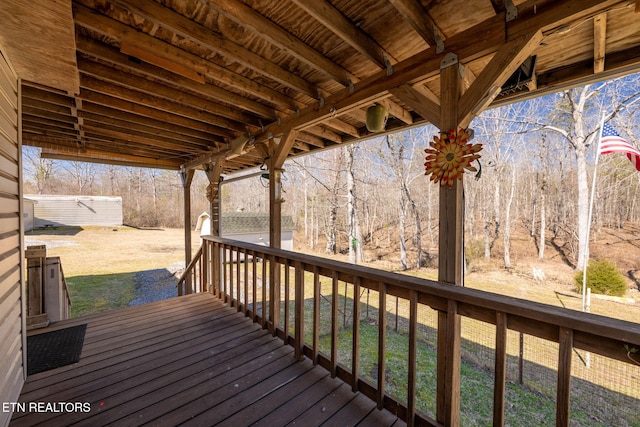 deck with an outbuilding