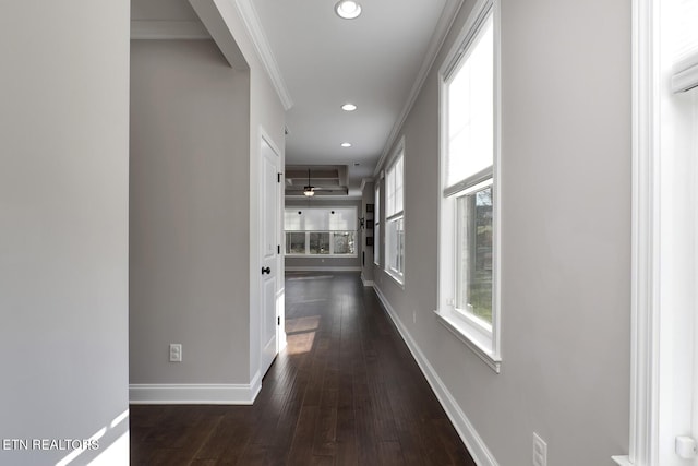 hallway featuring recessed lighting, baseboards, dark wood-style flooring, and crown molding