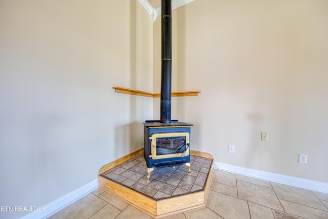 details with a wood stove and baseboards